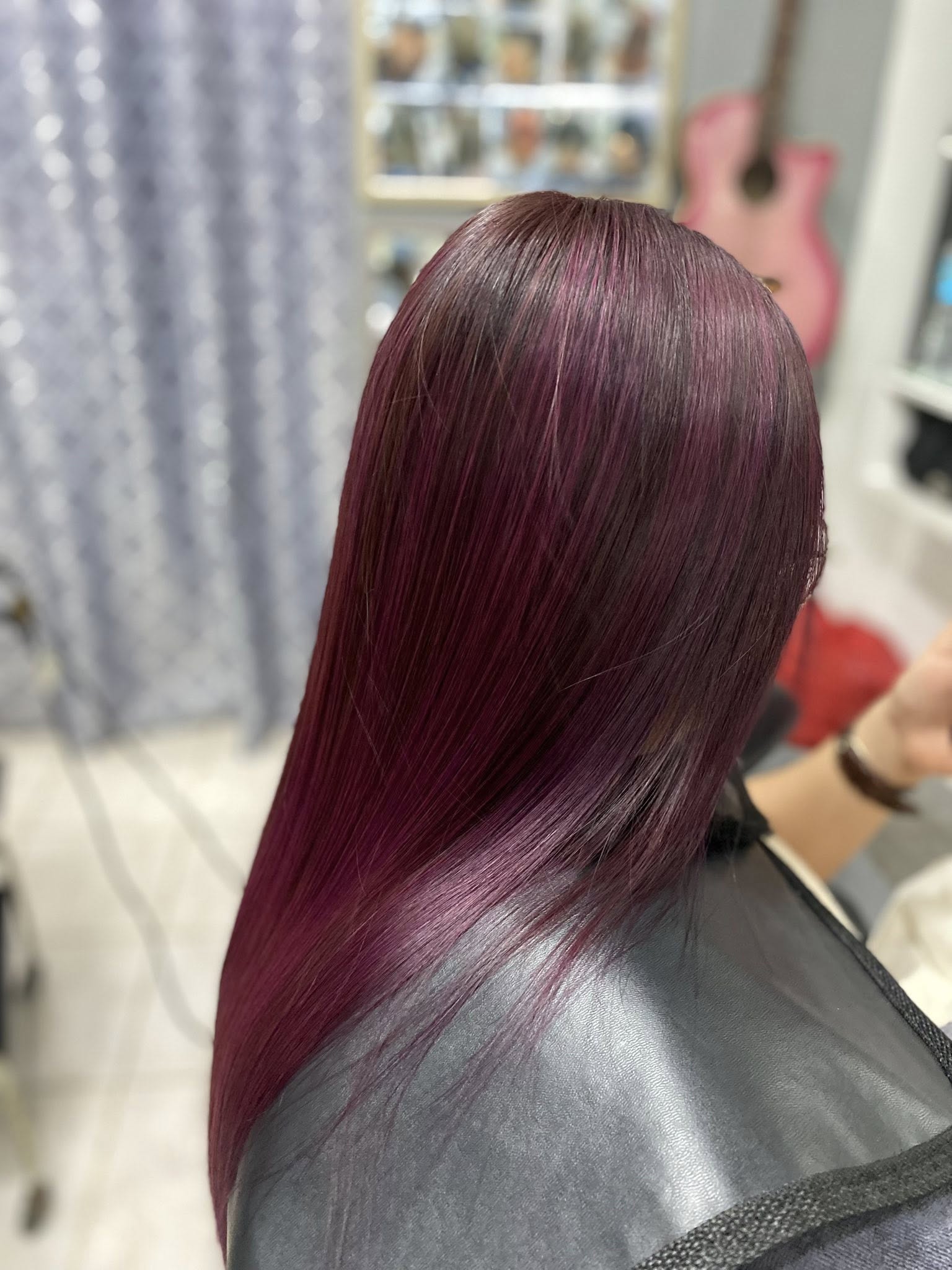 Vibrant red hair coloring service at Charlie's Barber & Salon in Angeles City